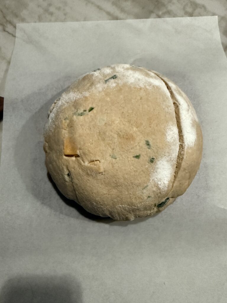 Jalapeno cheddar sourdough loaf Scored and ready for the oven