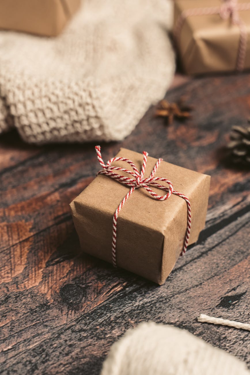 brown gift box on a wooden table