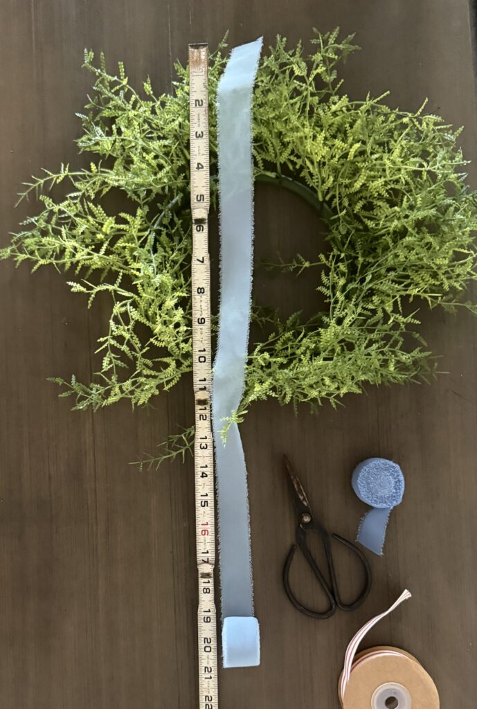 Tie a ribbon tail bundle on a wreath