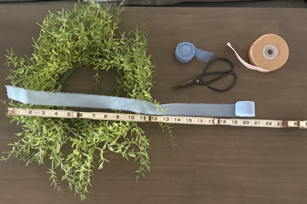 Tie a ribbon tail bundle on a wreath