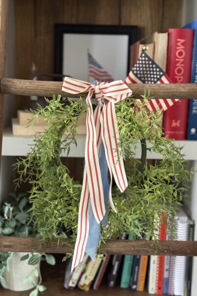 Tie a ribbon tail bundle on a wreath