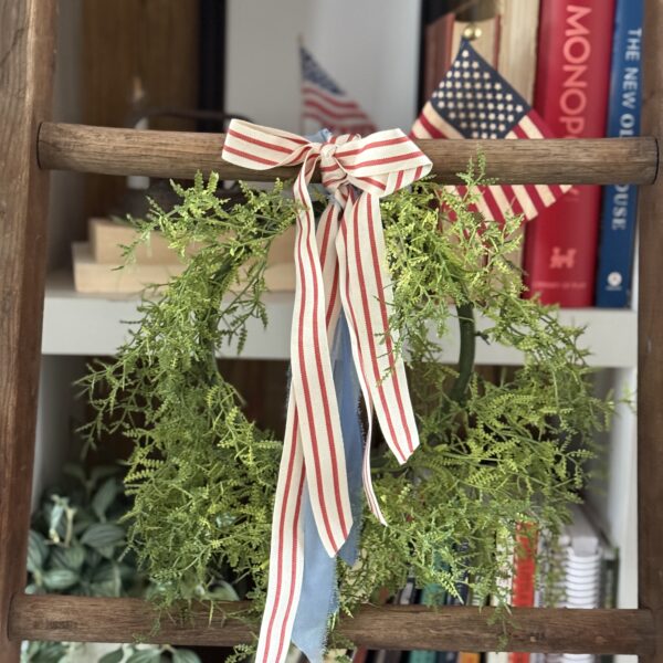 Tie a ribbon tail bundle on a wreath
