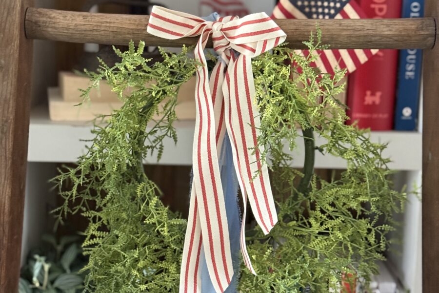 Tie a ribbon tail bundle on a wreath