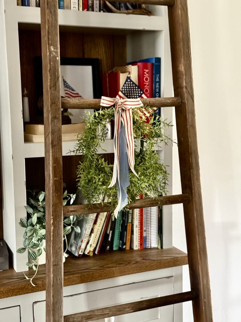 Tie a ribbon tail bundle on a wreath